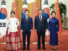 习近平同韩国总统李在明举行会谈 习近平同韩国总统李在明举行会谈