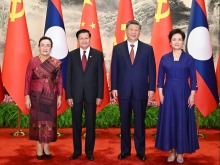 习近平同老挝人民革命党中央总书记、国家主席通伦举行会谈