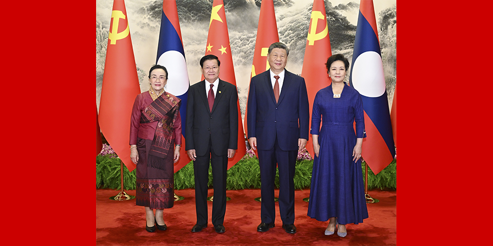 习近平同老挝人民革命党中央总书记、国家主席通伦举行会谈_fororder_2606059804901