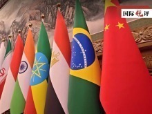 国际锐评丨“大金砖合作”越紧密 应对挑战的底气就越足