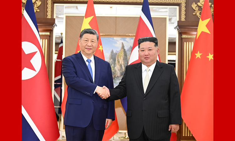 习近平同金正恩举行会谈
