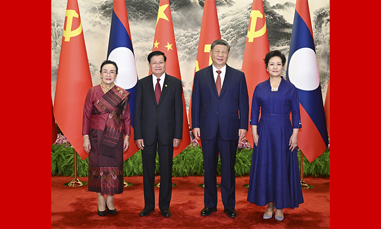 习近平同老挝人民革命党中央总书记、国家主席通伦举行会谈