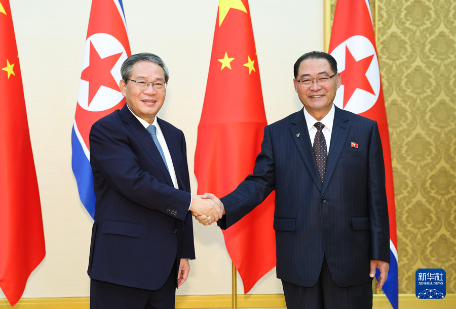 李强同朝鲜内阁总理朴泰成会谈