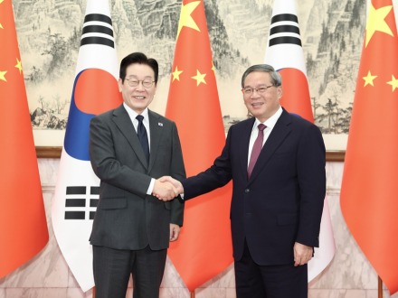 李强会见韩国总统李在明