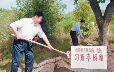 习近平擘画"绿水青山就是金山银山"